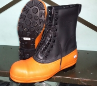 Boots - Rubber Bottom, Leather Top, Steel Toe, Chainsaw safety size 10- 15